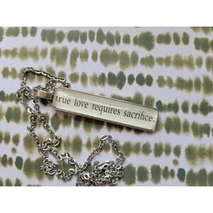 True Love Requires Sacrifice pendant necklace made with Hooked book pages